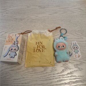Labubu Pin for Love- Confirmed “I” for imagination, in a blue/green (mint) color